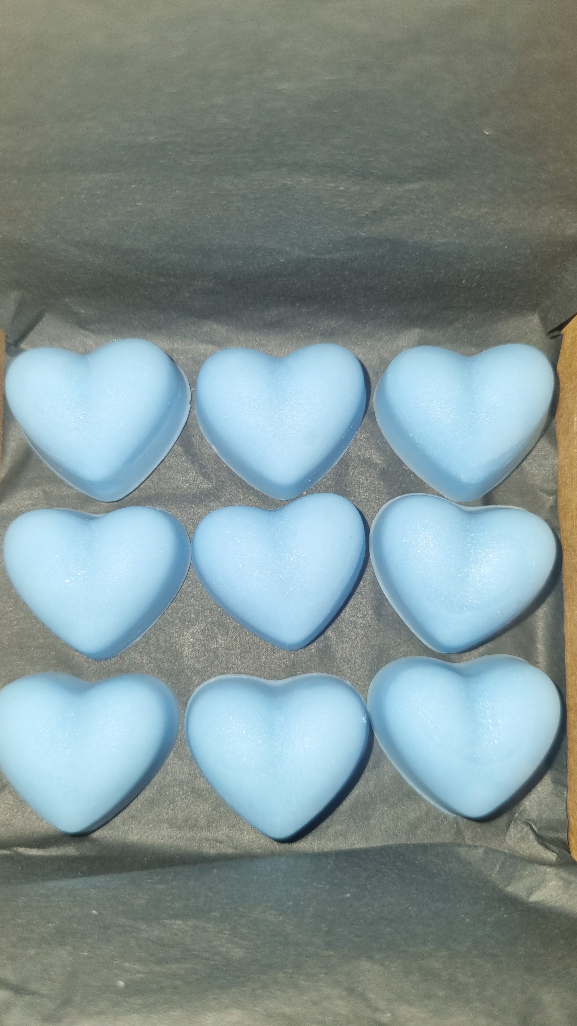 Blue soy bees wax melt hearts in baby powder scent